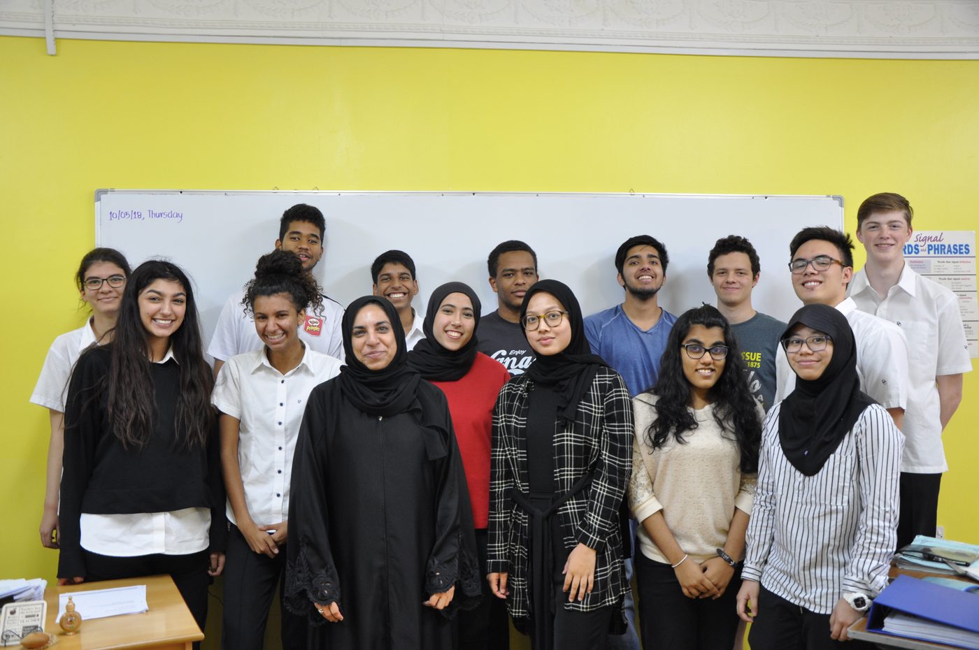 Ms Rifqa with a class of REC students